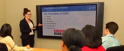 A CERC trainer explains the 6 principles of CERC during a training.